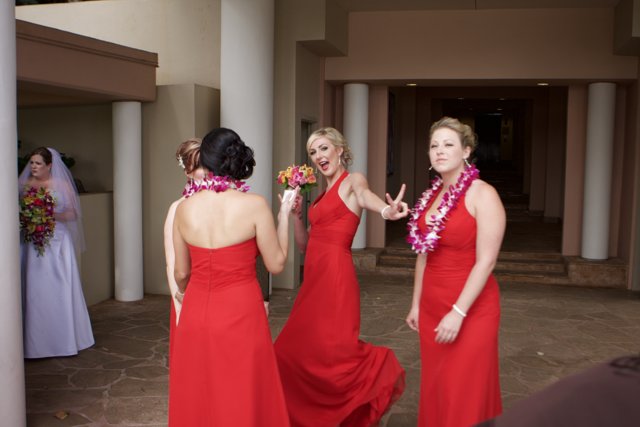 Three Brides in Red Dresses