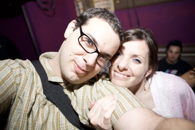 Couple Shares Joyful Moment at Nightclub Event