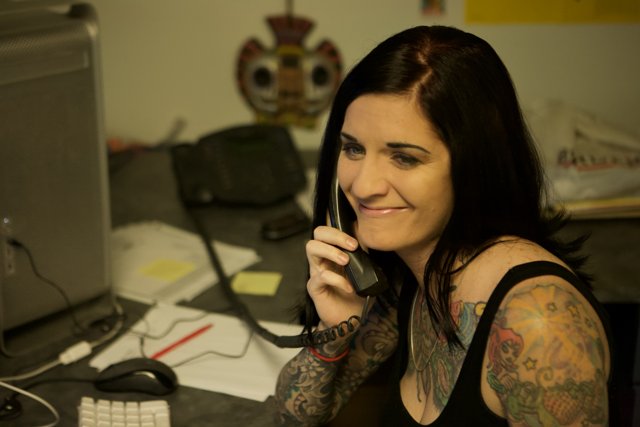 Tattooed Woman at the APC Office
