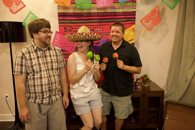 Friends Celebrate with Maracas at Fiesta Anniversary Party