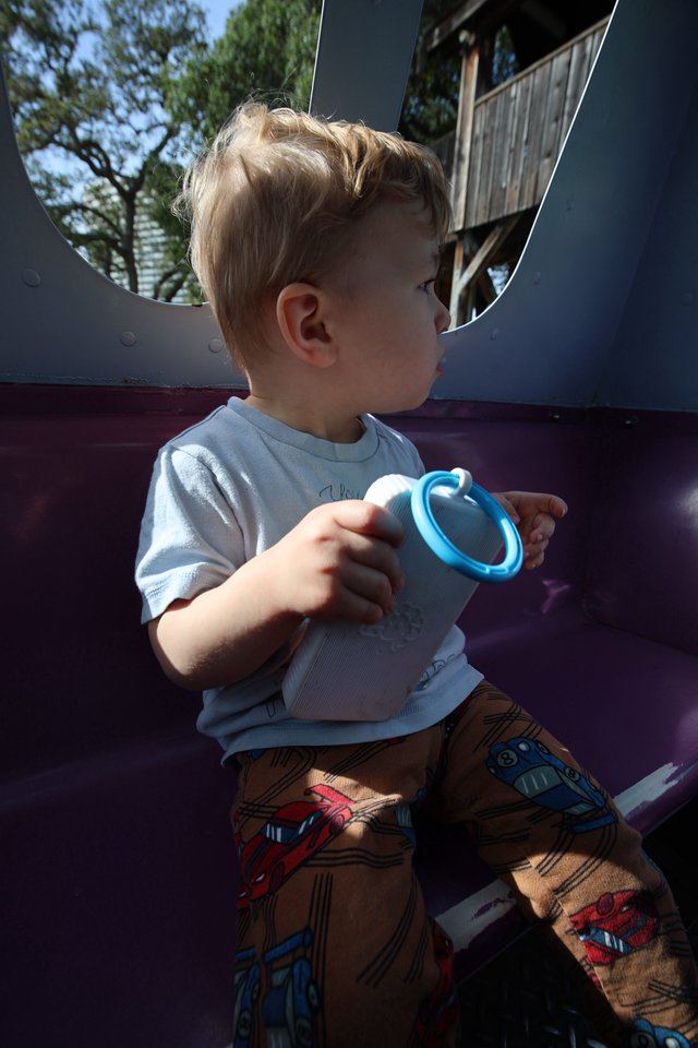 Toddler with Sippy Cup at Playground