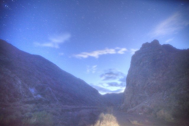 Majestic Mountain Range with Starry Night Sky