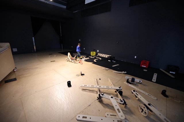 Assembly in Progress at Dark Exhibition Space