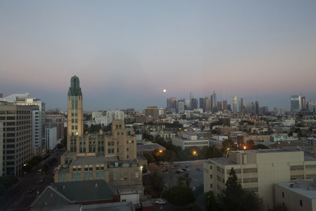 Moonrise Over the Urban Skyline