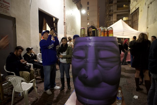 Purple Barrel with a Face on Display
