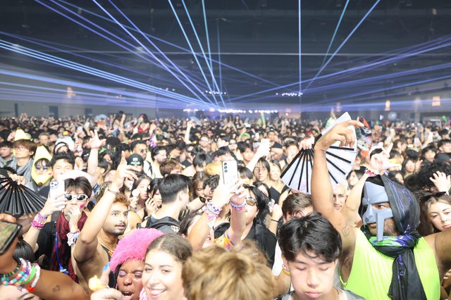 Massive EDM Crowd Erupts Under Laser Light Show