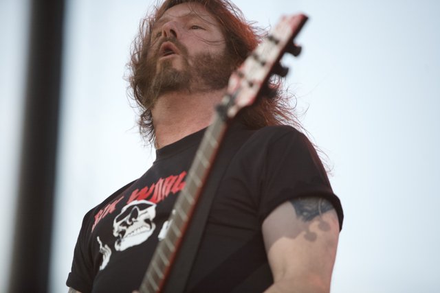 Guitarist with Long Hair and Beard Rocks Big Four Festival
