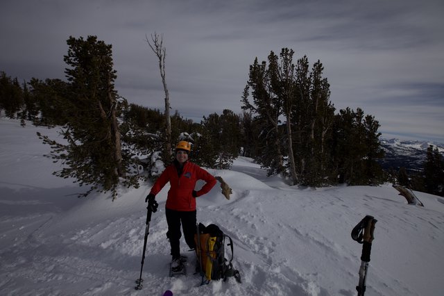 Winter Mountaineer Smiling on Snowy Sierra Summit