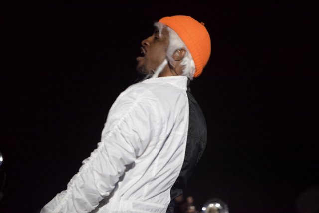 André 3000 Rocks an Orange Cap