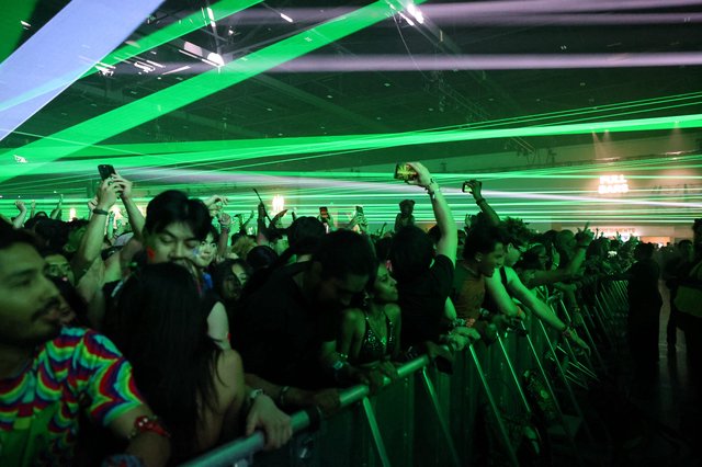 Green Laser Storm Over Wobbleland Festival Crowd