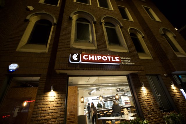 Chipotle Restaurant Storefront at Night in London