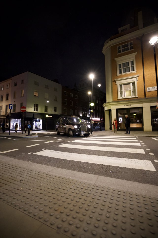 London Black Cab at Night Zebra Crossing