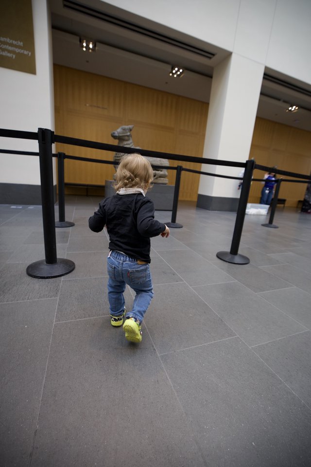 Toddler Exploring Contemporary Art Gallery Space