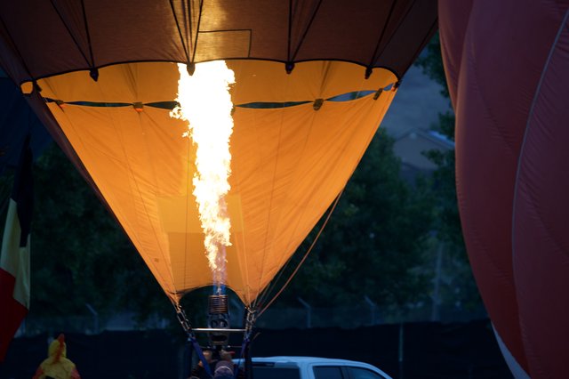 Inferno Within: Hot Air Balloon Inflation at Dawn