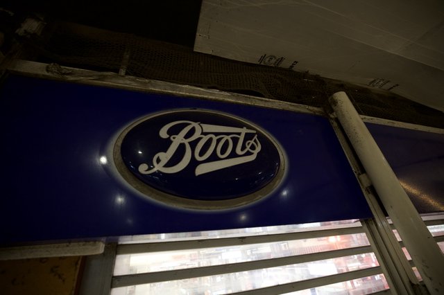 Vintage Boots Pharmacy Sign on London Street