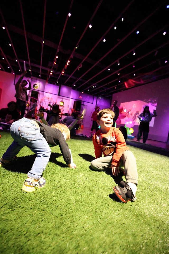 Children Playing at Baby Rave Event in Museum