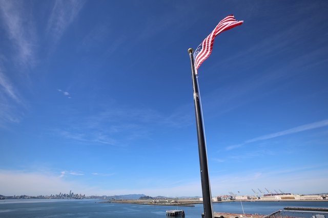 American Flag Flying Above San Francisco Bay Harbor