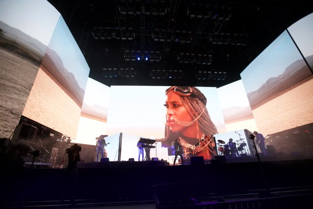 Solo Performance with Larger-Than-Life Backdrop