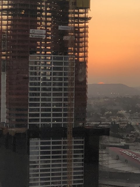 Urban Sunset Over High-Rise Construction