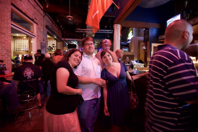 Friends Posing Together at Lively Austin Bar