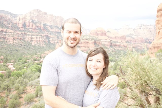 Couple Smiling Together Amid Sedona Red Rock Vistas