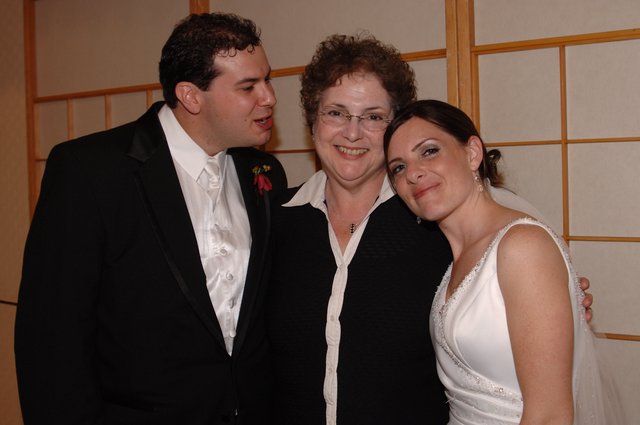 Bride and Groom Celebrate with Family at Wedding Reception