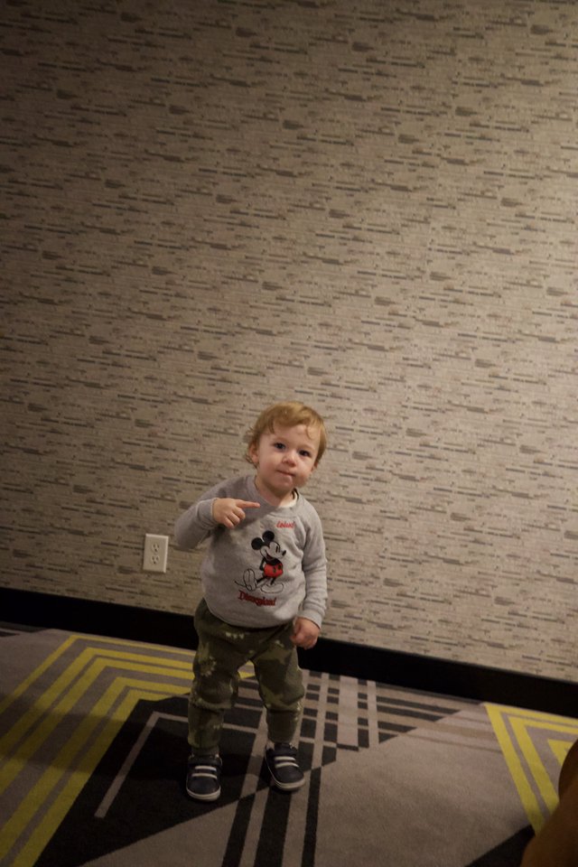 Toddler in Mickey Mouse Sweatshirt at Hotel