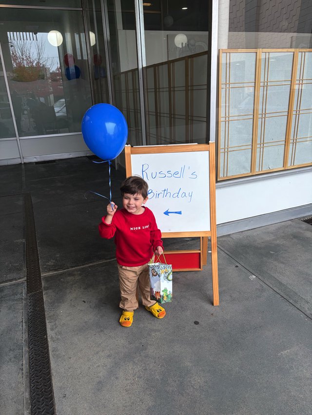 Young Boy Celebrating Russell's Birthday Party