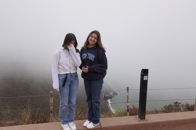 Friends Posing in Foggy Coastal Setting