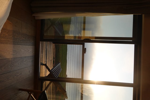 Sunrise Ocean View Through Glass Doors