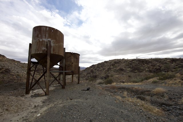 Rusty Water Tanks in the Desert