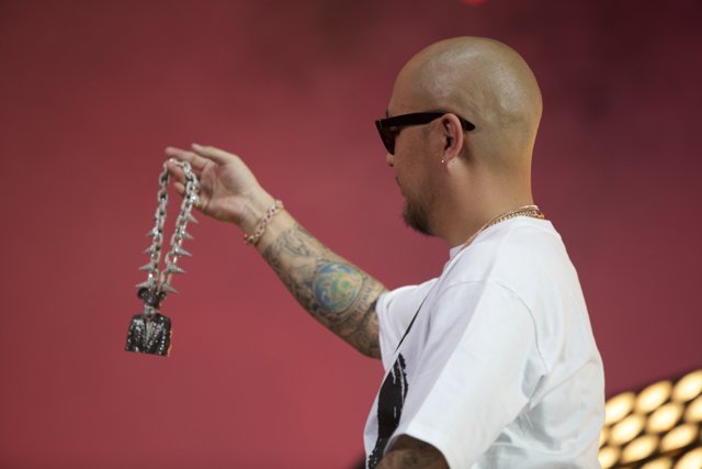 Tattooed Man with Chain
