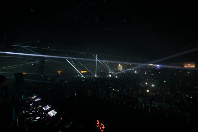 Laser Light Show Over Massive Outdoor Festival Crowd