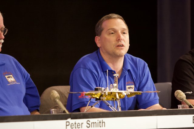 Three Men at Phoenix Landing Press Conference