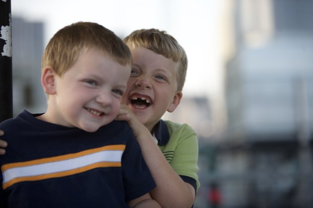 Joyful Smiles of Two Young Boys