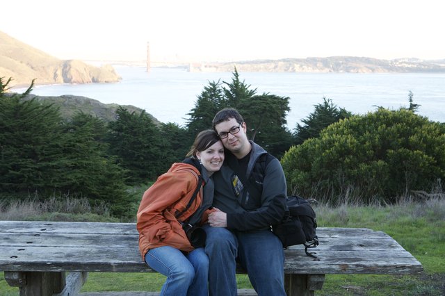Couple Embracing with Golden Gate Bridge Vista
