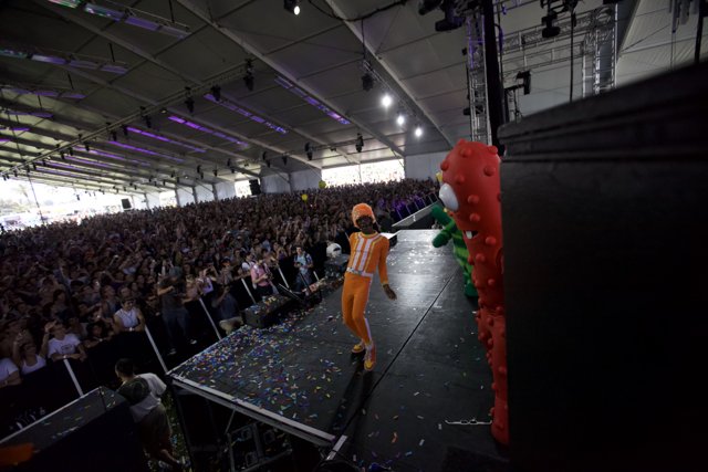 Orange Outfit on the Cochella Stage