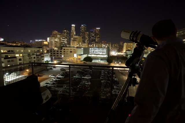 Urban Night Sky Captured by a Man