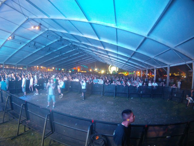 Nighttime Concert Crowd in a Tent