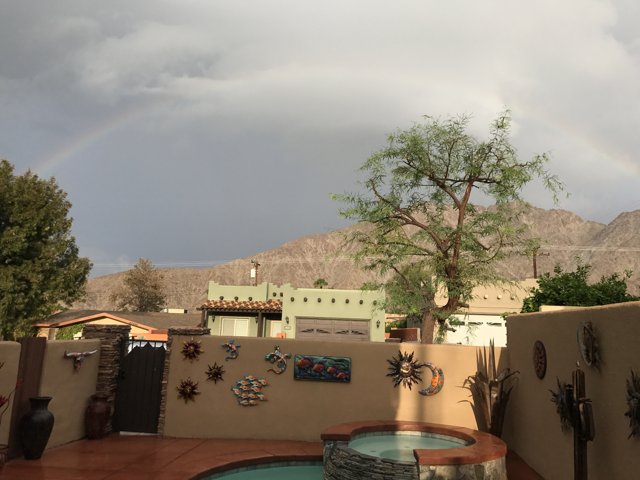 Enchanting Rainbow over Backyard Hot Tub