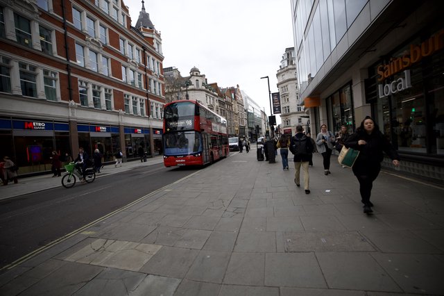 Double-Decker Bus on Busy London Shopping Street