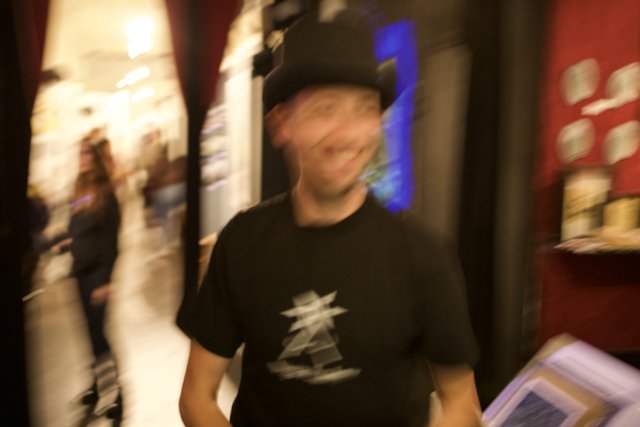 Blurry Man in a Hat