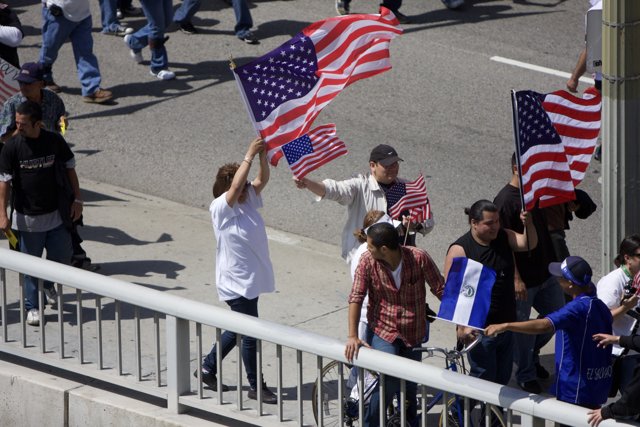 Mayday Rally Group Holds American Flags