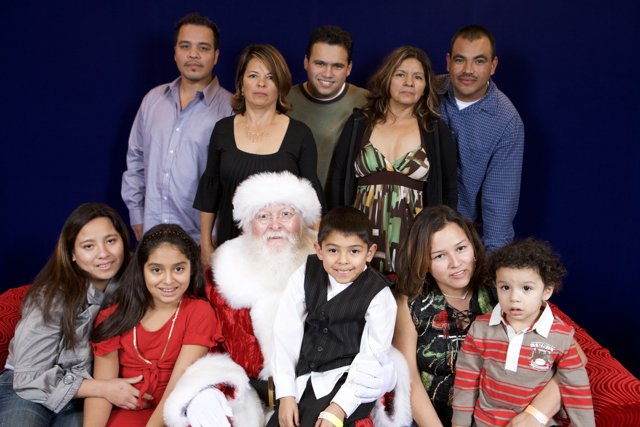 A Happy Family with Santa Claus at APC Christmas Party