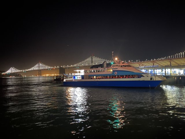 Nighttime Ferry Ride with the Bay Bridge in View