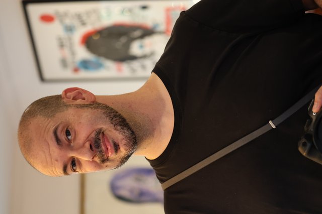 Portrait of Artist in Gallery Setting