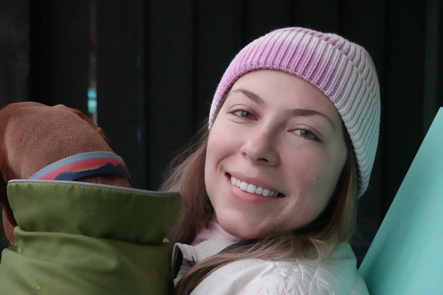 Young Woman Smiling in Winter Beanie