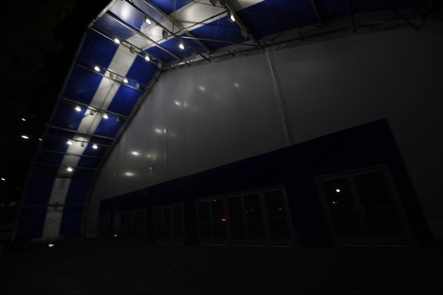 Blue and White Venue Stage Wall at Night