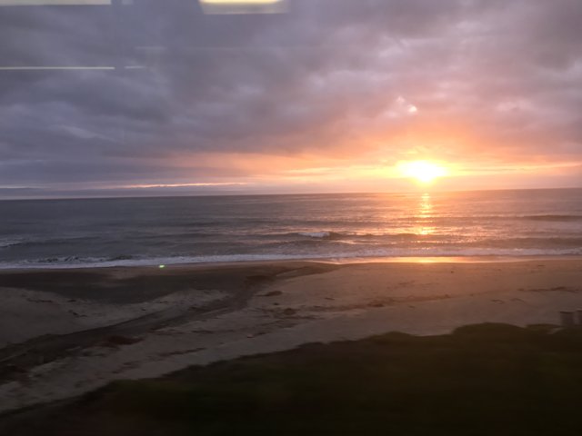 Sunset over the Ocean from a Train