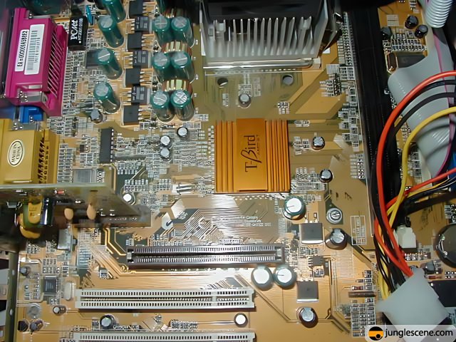 Yellow and Black Chip on Computer Motherboard